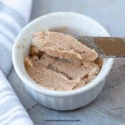 homemade cinnamon honey butter with a silver knife