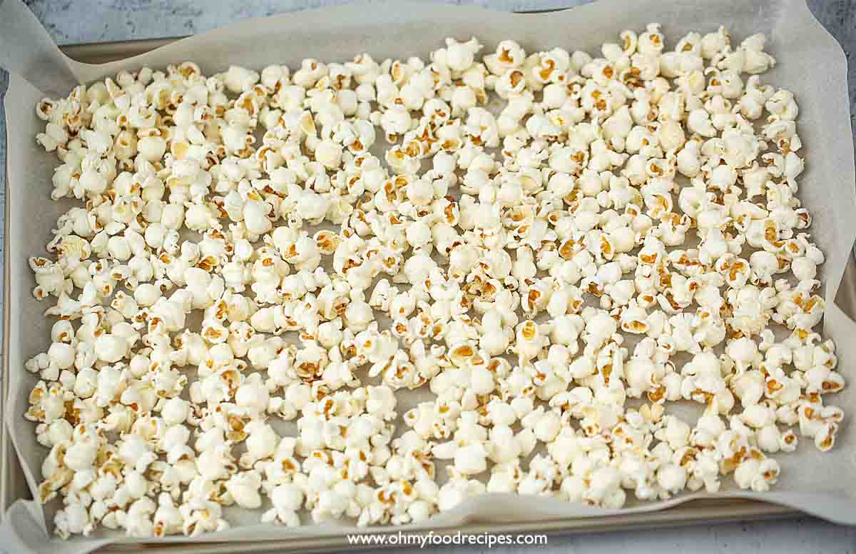 popcorn on the tray with a parchment paper