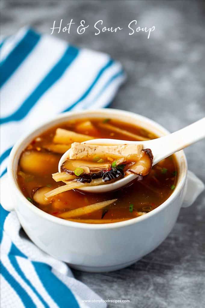 Chinese hot and sour soup on the spoon