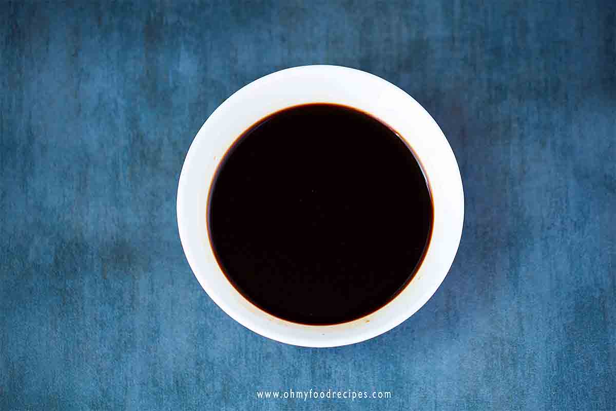 soy sauce mixture in the white bowl
