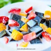 grass jelly dessert with fruit and milk
