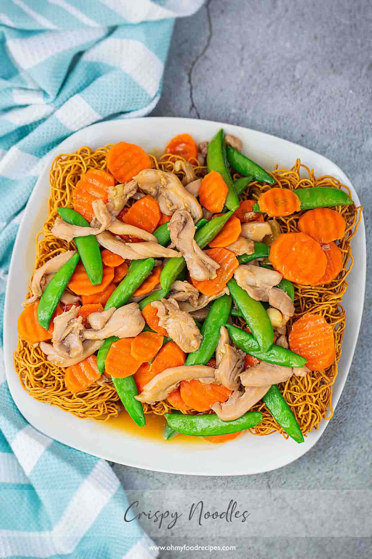 crispy noodles with chicken and vegetables top view