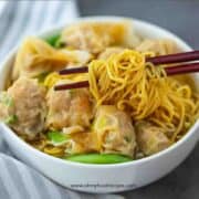 wonton noodle soup chopstick holding the noodle horizontal