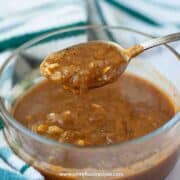 homemade black pepper sauce on the silver spoon horizontal