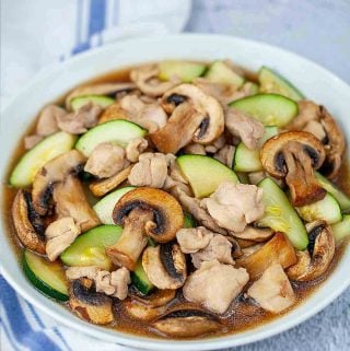 chicken zucchini mushroom stir fry on a plate