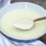 a scoop of ginger milk pudding on a silver spoon