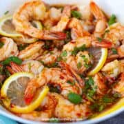 Spicy lemon garlic shrimp in the bowl close up