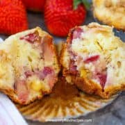 homemade fresh strawberry and white chocolate chip muffin half horizontal