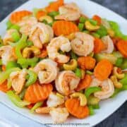 Cashew shrimp stir fry in the white plate horizontal