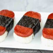3 Hawaiian spam musubi on the white plate horizontal