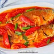 Chinese tomato fish on the white plate top view
