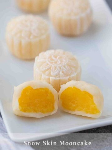 snow skin mooncake with custard filling cut open half