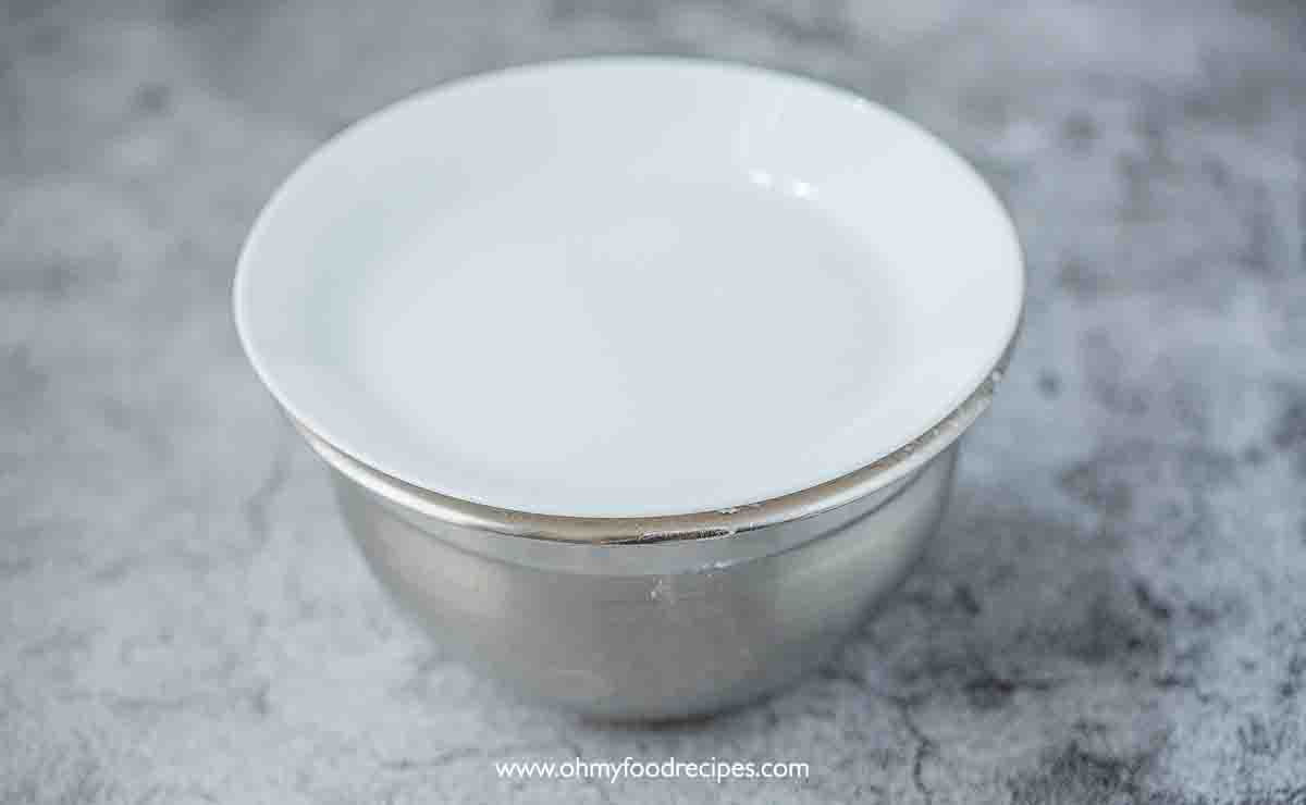 plate over the bowl