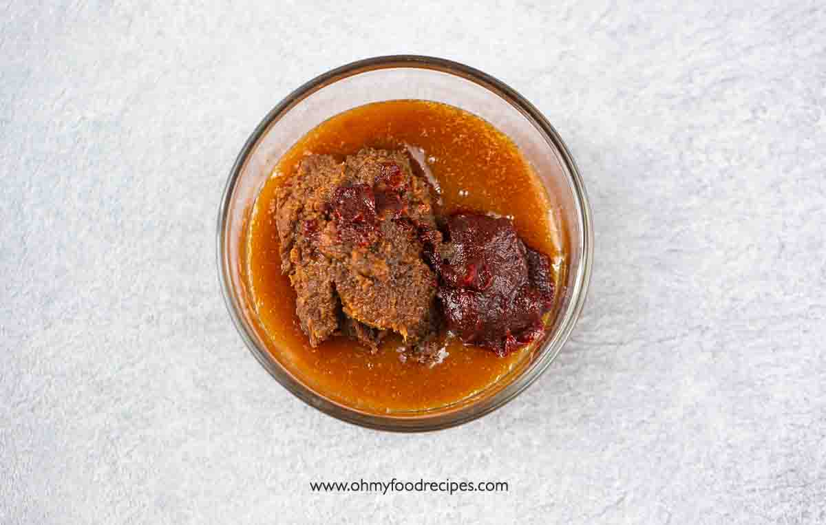 doenjang (Korean soybean paste) and gochujang (Korean chili paste) add into the raw honey top view