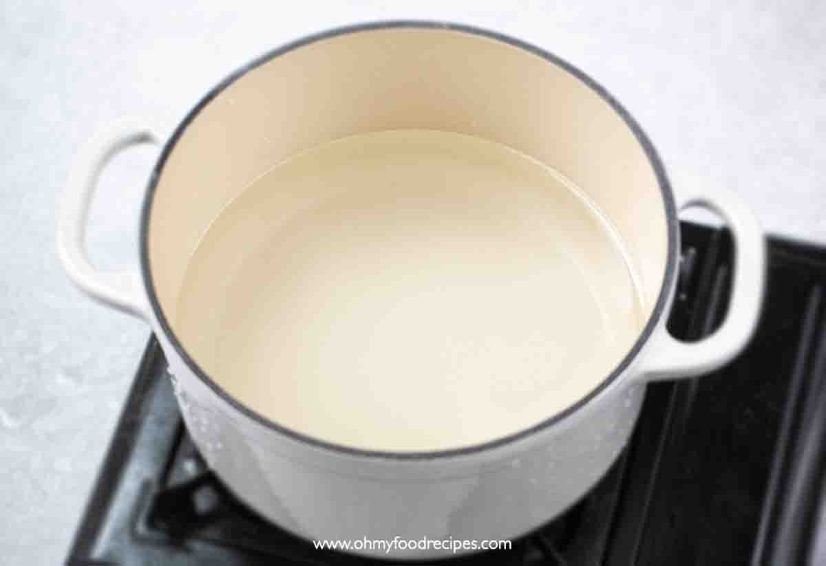 water in the pot over the stove