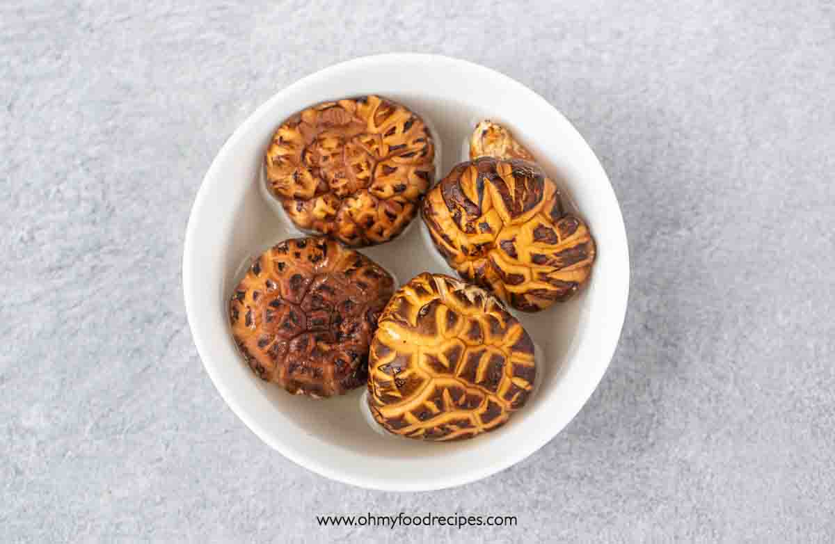 soaking shiitake mushrooms in the bowl top view