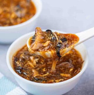 imitation shark fin soup wun zai chi in the bow with a spoon