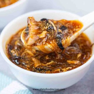 imitation shark fin soup or wun zai chi in a bowl with a spoon